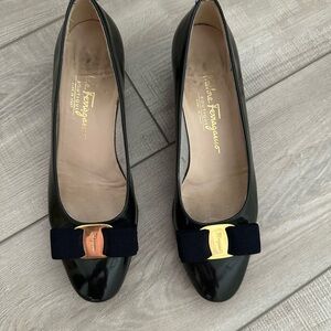 Dark green Salvatore Ferragamo, 7.5B  Black Heels with Gold Accent.